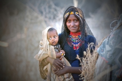 Ethiopia, Afar woman between corrall fence