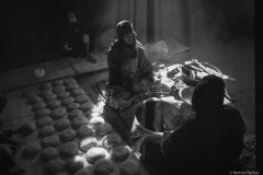 Afghanistan women baking bread