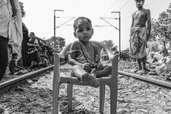 India, Colcutta, child on chair